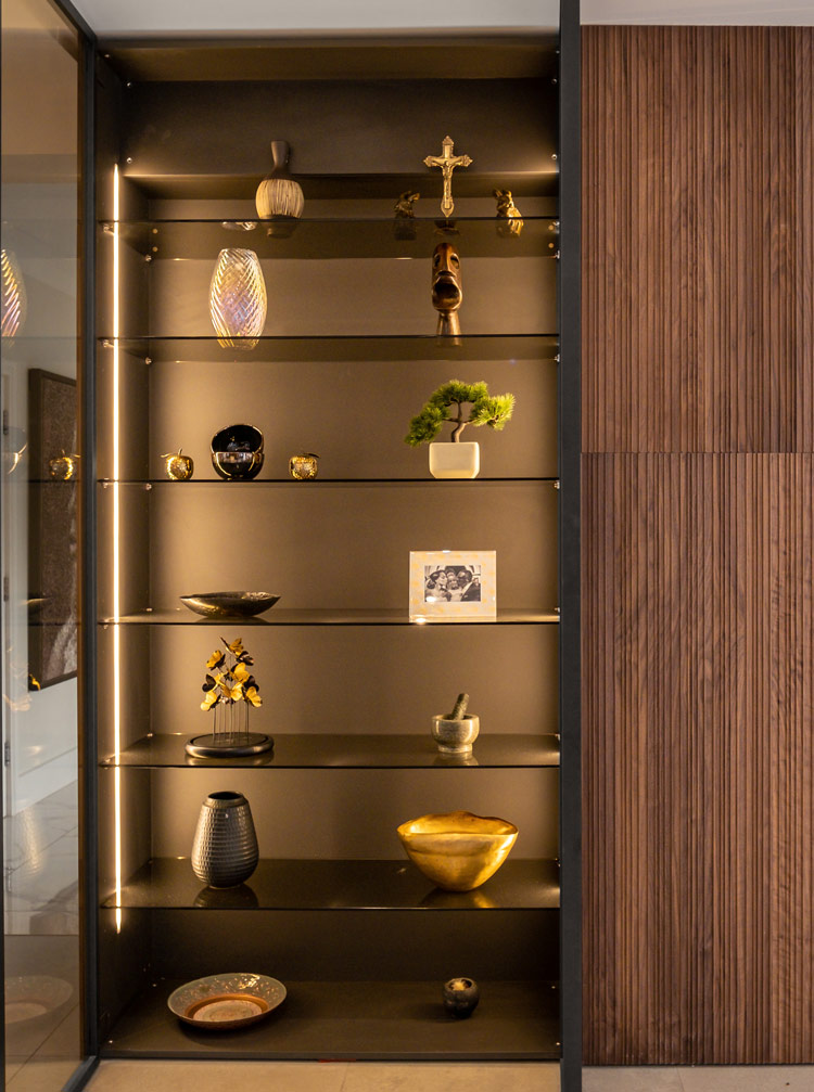 Tall Glix cabinets with bronze reflective glass fronts and walnut canaletto timber | Italian luxury kitchen by Fontana London | Design as Art